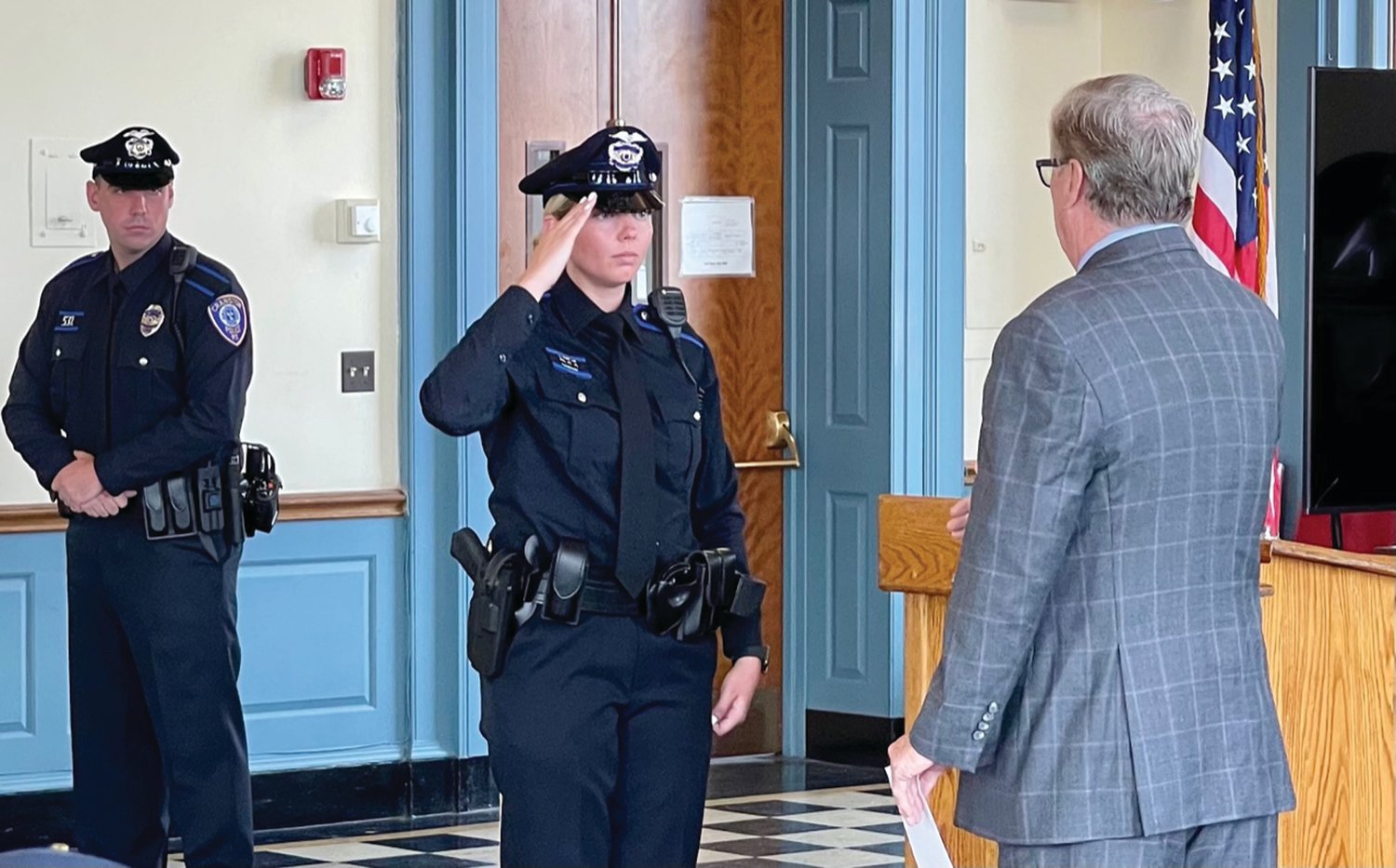 Officer Cooper being sworn in by Mayor Hopkins
